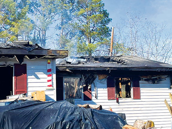 'Fully involved' house fire injures man, many departments respond