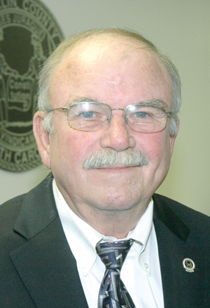 County commissioner John May dies at 67