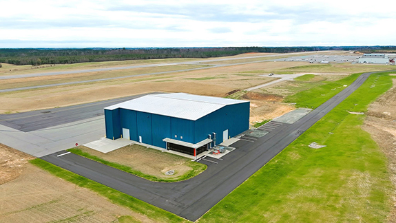 <i>Access road added to county's airport</i>