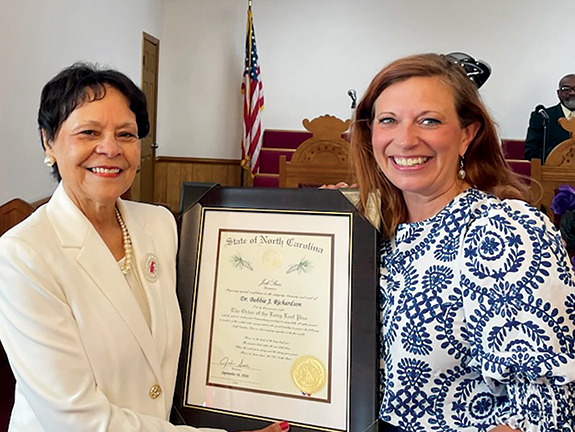 <i>Selfless, lifelong 'servant' receives 'Long Leaf Pine'</i>