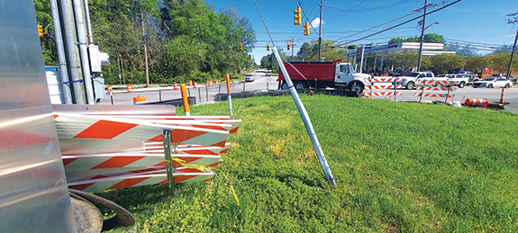 Progress on Youngsville's road projects is like stop & go traffic